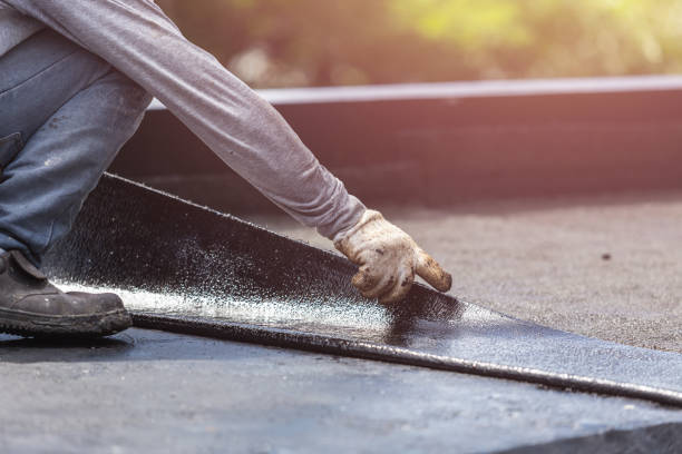 Professional Waterproofing technician working in Fredericksburg, VA